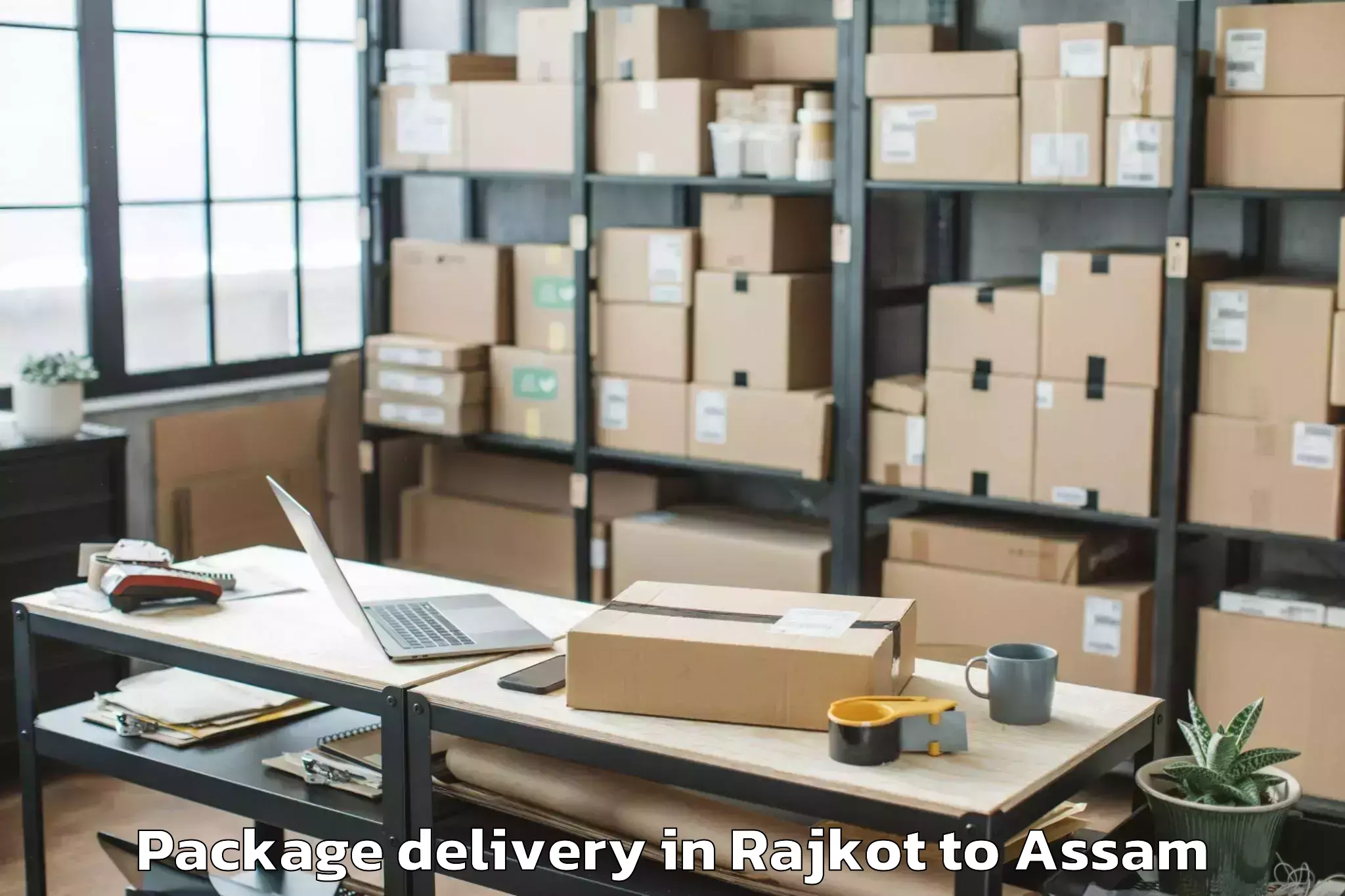 Quality Rajkot to Rajakhat Banekuchi Package Delivery